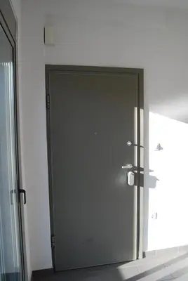 a large door in a room with a mirror at The Best View !!! in Athens