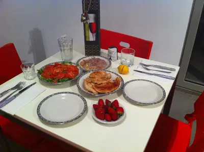 a table with plates of food and fruit on it at The Best View !!! in Athens