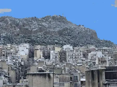 a view of a city with a mountain in the background at The Best View !!! in Athens