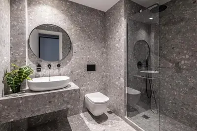 a bathroom with a sink and a toilet and a mirror at Elliot Petralona, Athens in Athens