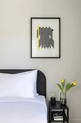 a bedroom with a bed and a picture on the wall at Elliot Petralona, Athens in Athens