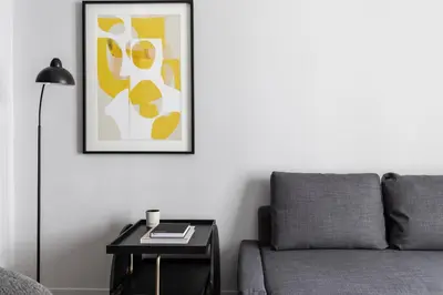 a living room with a couch and a table at Elliot Petralona, Athens in Athens