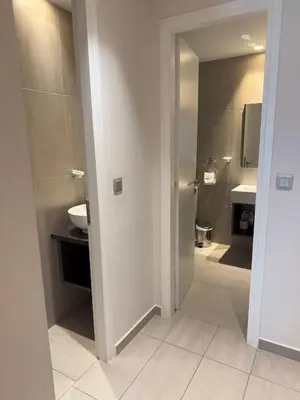 a bathroom with a toilet and a sink at Urban Muse Apartments - Archaeological Museum of Athens in Athens