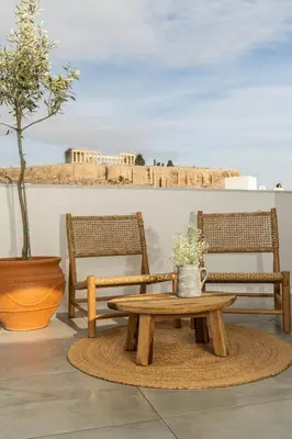 a table and two chairs and a table and a table sidx sidx sidx at The Minion Elegant Suite - Acropolis View in Athens