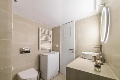 a bathroom with a toilet and a sink at Home1 in Athens