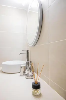 a bathroom with a sink and a mirror at Home1 in Athens