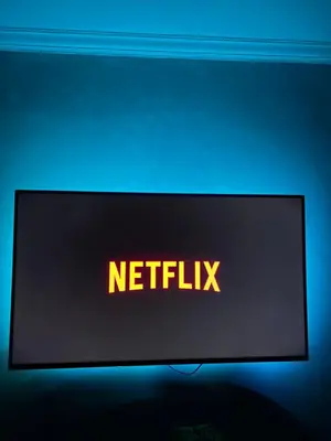 a monitor with the word netflix written on it at Athens comfy apartment in Athens