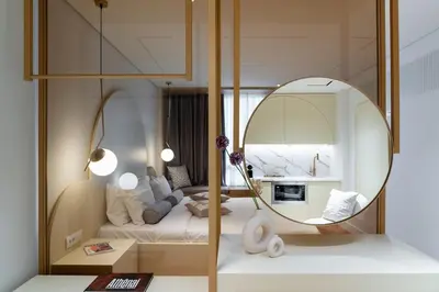 a room with a mirror and a bed with a bed sqor at Acropolis View By Ermou in Athens
