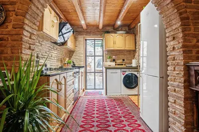 a kitchen with a washer and dryer at Olvion House in Athens