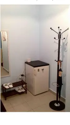 a bathroom with a shower stall and a machine at BUDGET FLAT , 10 min from Victoria square in Athens
