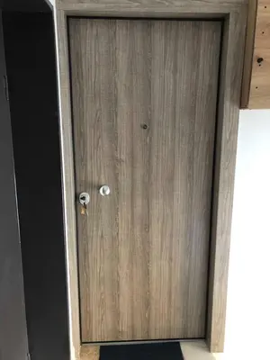 a wooden door with a knob in a room at Athens downtown rooftop loft #2 in Athens