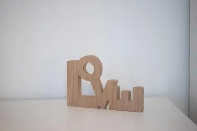 a wooden sign that says rah on a white wall at Niki Athens Suites - Urban Suite at Historical Centre Monastiraki in Athens