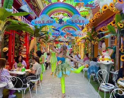 a woman in a dress dancing in a mall at Niki Athens Suites - Urban Suite at Historical Centre Monastiraki in Athens