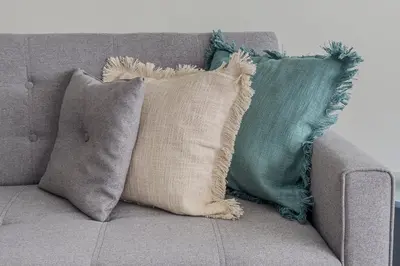 a group of pillows sitting on a couch at Zen Ermou City Center 1 in Athens