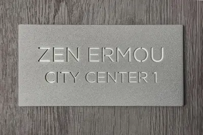 a sign that says zen eminem city center at Zen Ermou City Center 1 in Athens