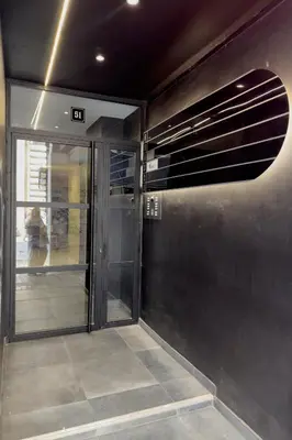 an entrance to a building with a glass door at Zen Ermou City Center 1 in Athens