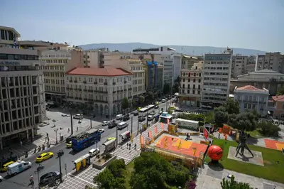 an overhead view of a city with a busy street at Poseidon Suite Korai by Zeus Suites in Athens