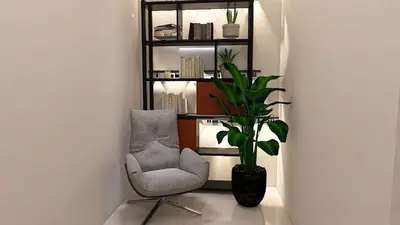a living room with a chair and a plant at Cozy and Modern Flat in Athens