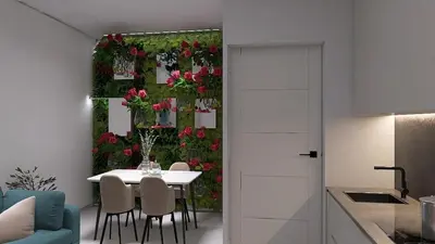 a dining room with a table and flowers on a wall at Cozy and Modern Flat in Athens