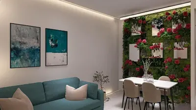 a living room with a couch and a table and flowers at Cozy and Modern Flat in Athens