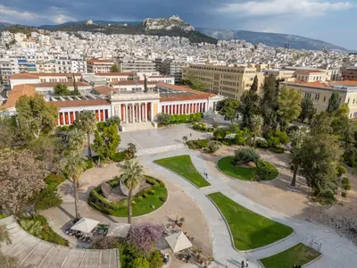 an aerial view of a city with buildings and trees at Museum District Apartment in Athens