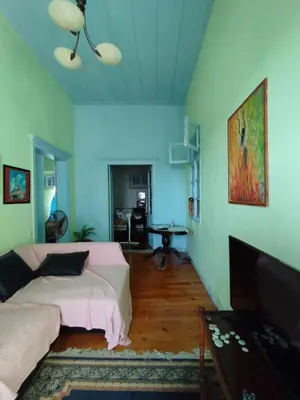 a bedroom with a bed and a table in a room at CuteStudio in Athens