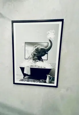 a picture of an elephant in a bath tub at Syntagma Center Suite by Zeus Suites in Athens