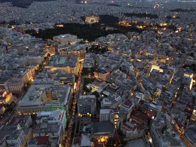 an aerial view of a city at night at Syntagma Center Suite by Zeus Suites in Athens