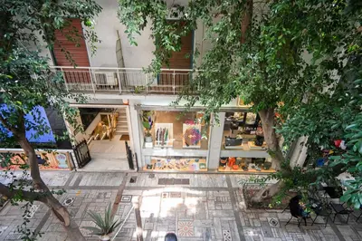 an overhead view of a store with trees in front at Tsakalof 10A Elegant Studio by Zeus Suites in Athens