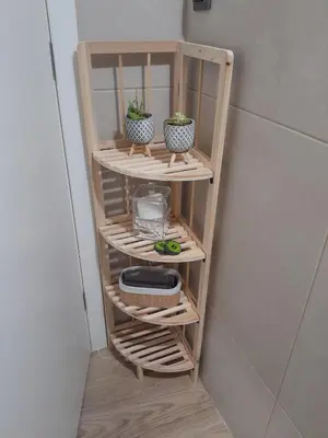 a shelf with two plants on it in a room at Modern apartment with patio in Athens