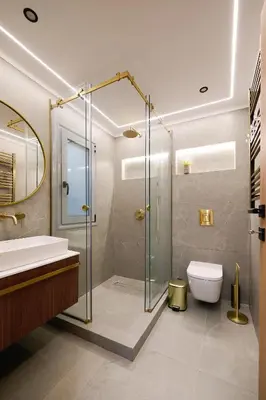 a bathroom with a shower and a toilet and a sink at Panos City Apartment - Private parking for motorcycles in Athens