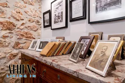 a counter with a bunch of pictures on a wall at Classic Studio A2 - 2ppl in Athens