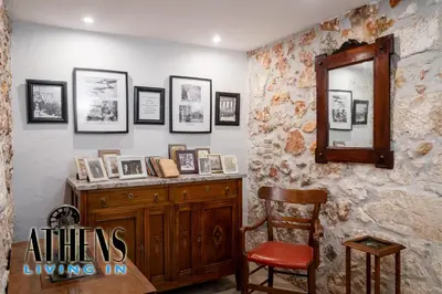 a room with a mirror and a wooden cabinet and a chair at Classic Studio A2 - 2ppl in Athens