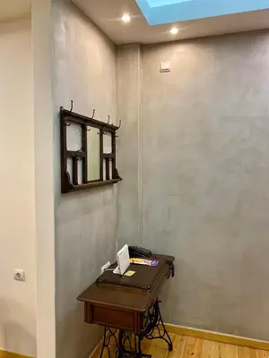 a room with a table and a mirror on a wall at Athens Acropolis Living in Athens