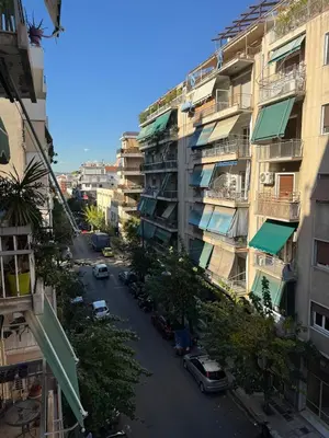 an aerial view of a city street with buildings at AtticNest in Athens