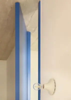 a glass door with a lamp on it at Apartment in Exarchia in Athens