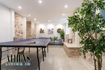 a ping pong room with a ping pong table at Classic Residence A3 apt 4ppl with Jacuzzi in Athens