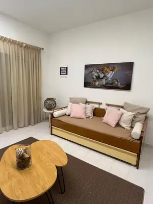 a living room with a couch and a table at Jimilio 1 in Spáta