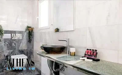 a bathroom with a bowl sink on a counter at Classic Residence B2 apt - 6ppl in Athens