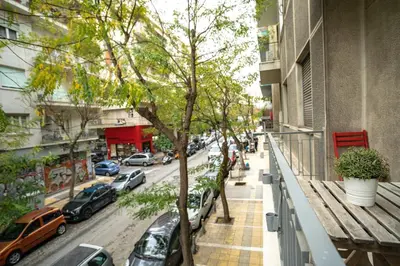 a balcony with a view of a street with cars at Central Athens Apt Street View by MPS in Athens