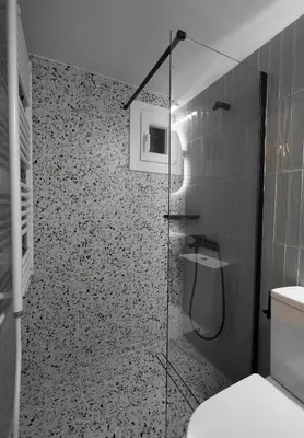 a bathroom with a glass shower with a toilet at Neos Kosmos Studio For 2 by MPS in Athens