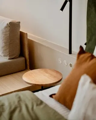 a living room with a couch and a table at Ermou 18 Private Jacuzzi Apartment in Athens