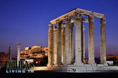 an ancient temple with columns in front of a building at Endless Blue Breathtaking View Apt 6fl 2&4ppl in Piraeus