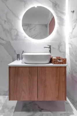 a bathroom with a sink and a mirror at Callisto Elegant Apartment Near Acropolis in Athens