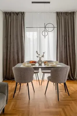 a dining room with a table and two chairs at Modern Designer Apartment in Athens Walk to Plaka & Acropolis in Athens