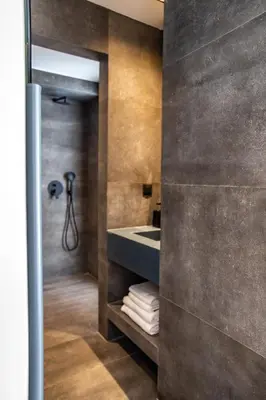 a bathroom with a sink and a shower at NOOS Acropolis in Athens