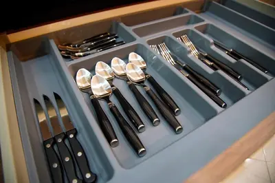 a drawer filled with utensils and forks and knives at Aegean Modern Escape VIPGreece in Piraeus