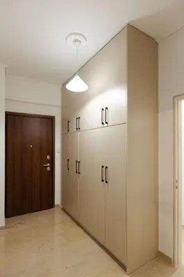 a row of lockers in a room with a door at Amaltheia athens in Athens
