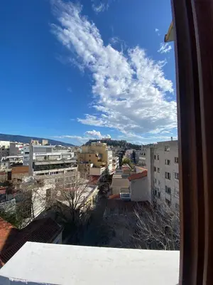 a view from a window of a city at Mosaics Penthouse studio 360'View in Athens