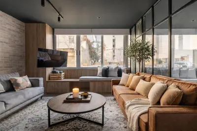 a living room with a couch and a table at Acropolis Industrial Loft in Athens